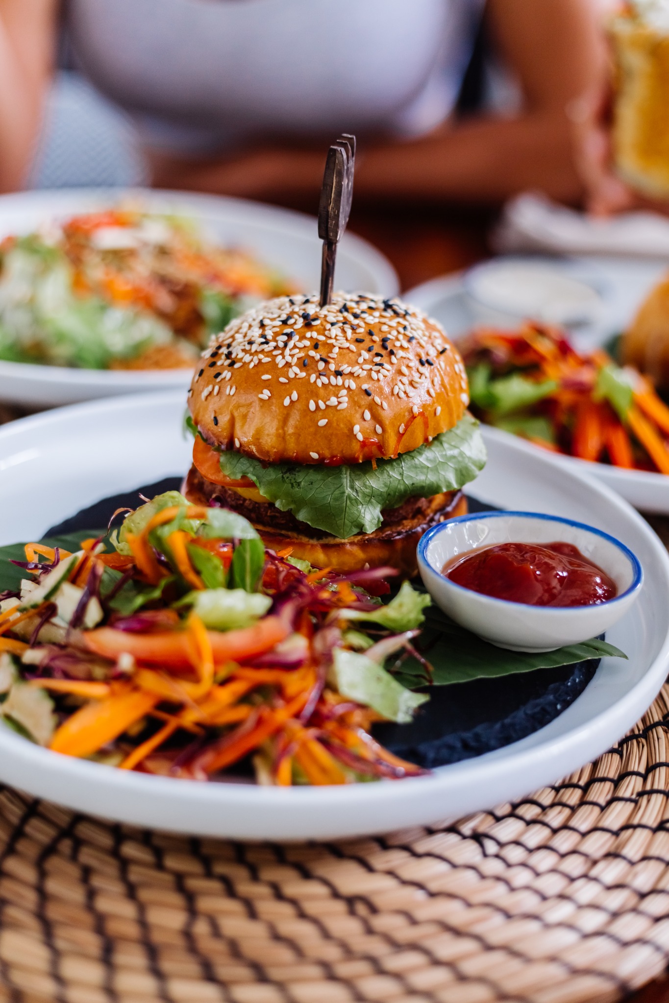Juicy F1 Cafe burger with fresh vegetables